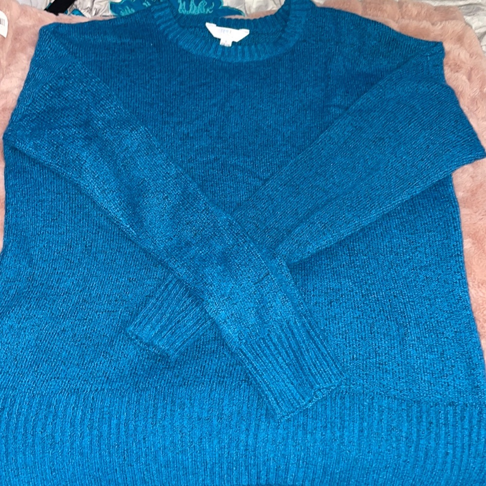 Blue colored large sized sweater